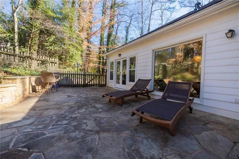 a view of a park with large trees