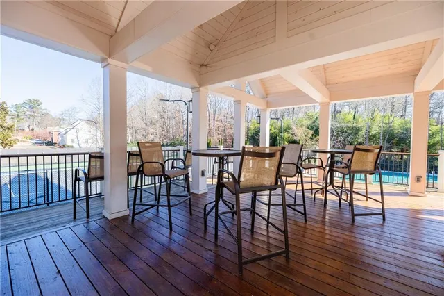 a view of a house with a yard and pathway