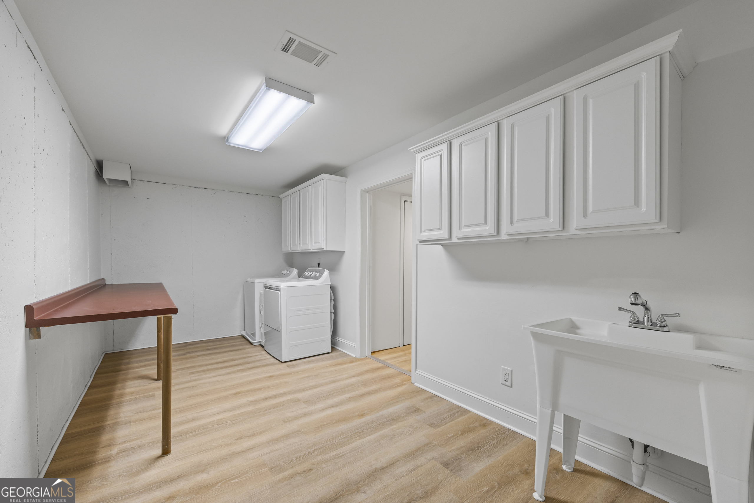 1270 Swords Road Greensboro, GA 30642 - Photo 34 of 41 a bathroom with a sink and a mirror