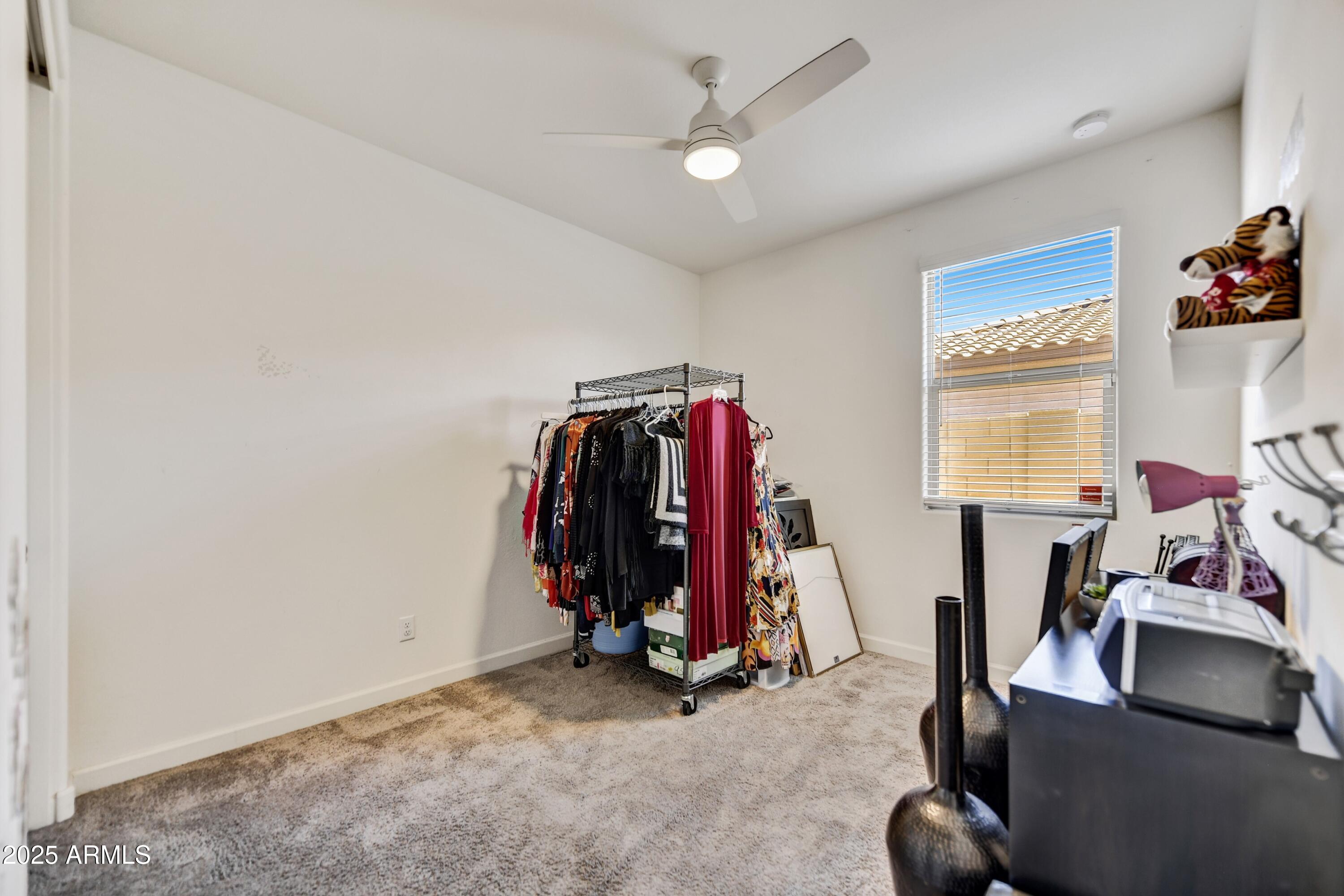 2745 West Pollack Street Phoenix, AZ 85041 - Photo 13 of 20 a view of a room with gym equipment