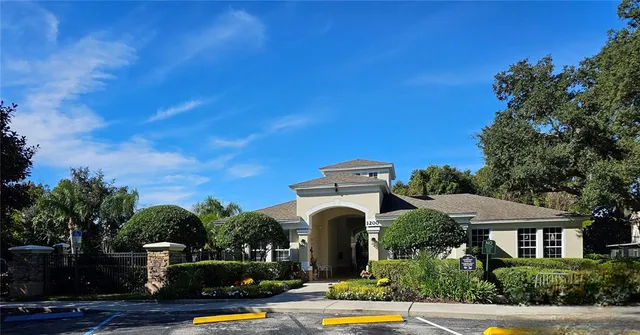 a view of multiple houses with yard