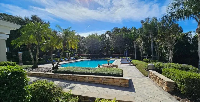 a view of a backyard with a patio