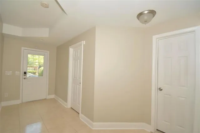 an empty room with windows