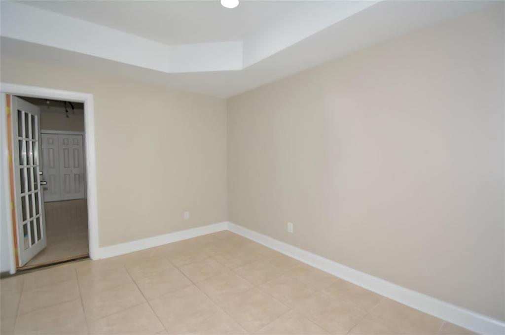 618 Tradwell Place Northeast, Unit BSMT Dacula, GA 30019 - Photo 5 of 20 a view of an empty room