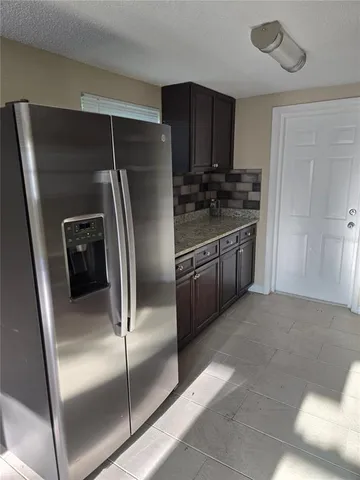 a view of a window in an empty room