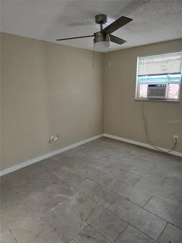 a view of a room with an empty space
