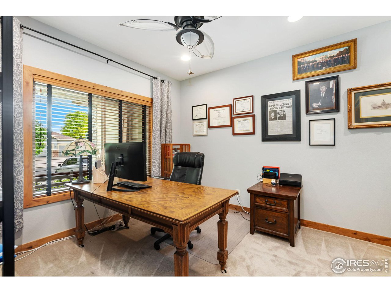 8265 Spinnaker Bay Drive Windsor, CO 80528 - Photo 25 of 40 a view of a workspace with furniture