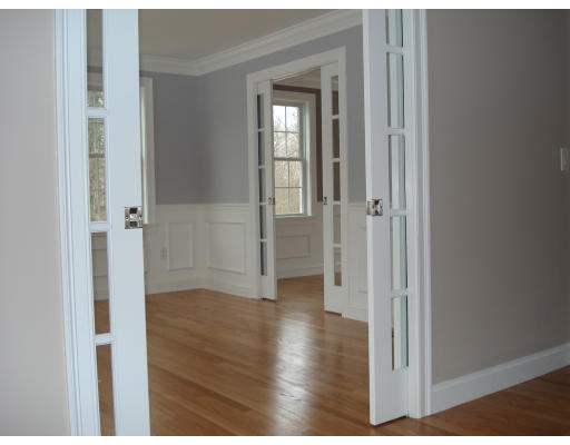 76 Prospect Street Canton, MA 02021 - Photo 3 of 6 a view of a hallway with wooden floor