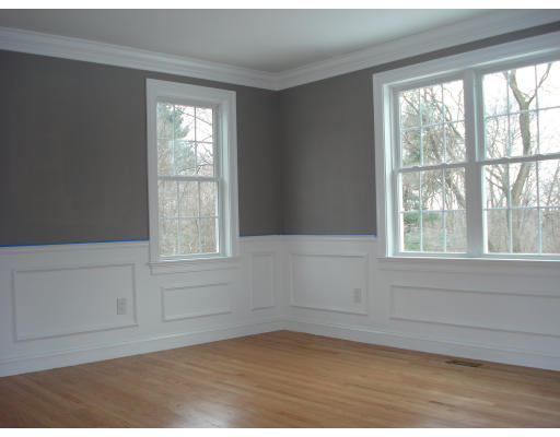 76 Prospect Street Canton, MA 02021 - Photo 4 of 6 an empty room with wooden floor and windows