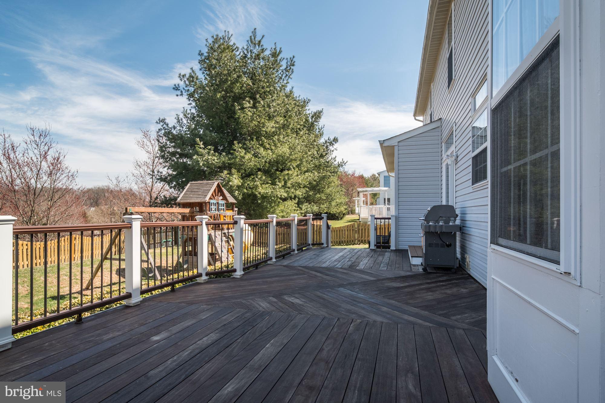 14221 Autumn Gold Road Boyds, MD 20841 - Photo 32 of 36 Expansive Rear Deck