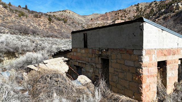 7500 Spring Canyon Road Helper, UT 84526 - Photo 24 of 83 View of side of home with a mountain view and stone siding