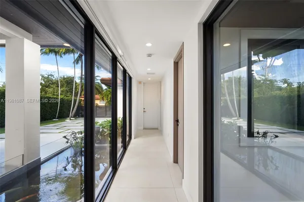 a bathroom with a tub and shower