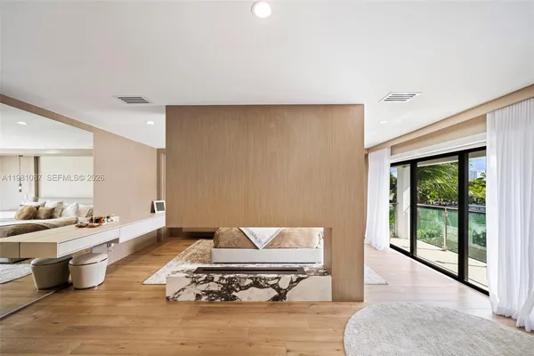 a living room with furniture and a table