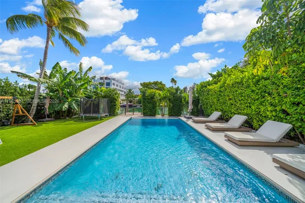 a view of a lake with a garden