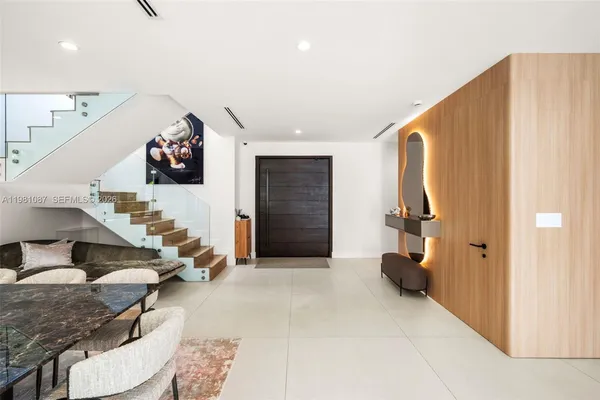 a view of a livingroom with storage and utility