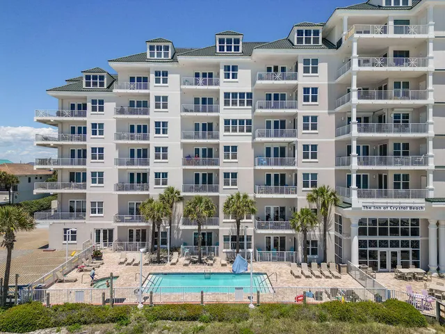a kitchen with stainless steel appliances granite countertop a stove and a refrigerator