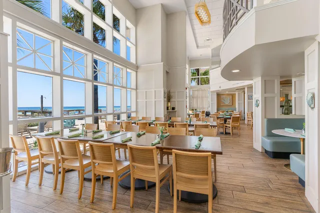 a view of swimming pool with a chairs