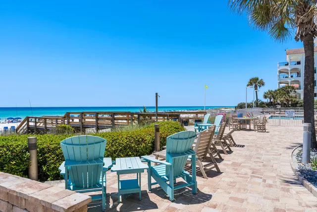 a view of swimming pool with seating space