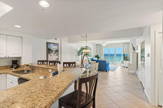 a very nice looking kitchen with a large window