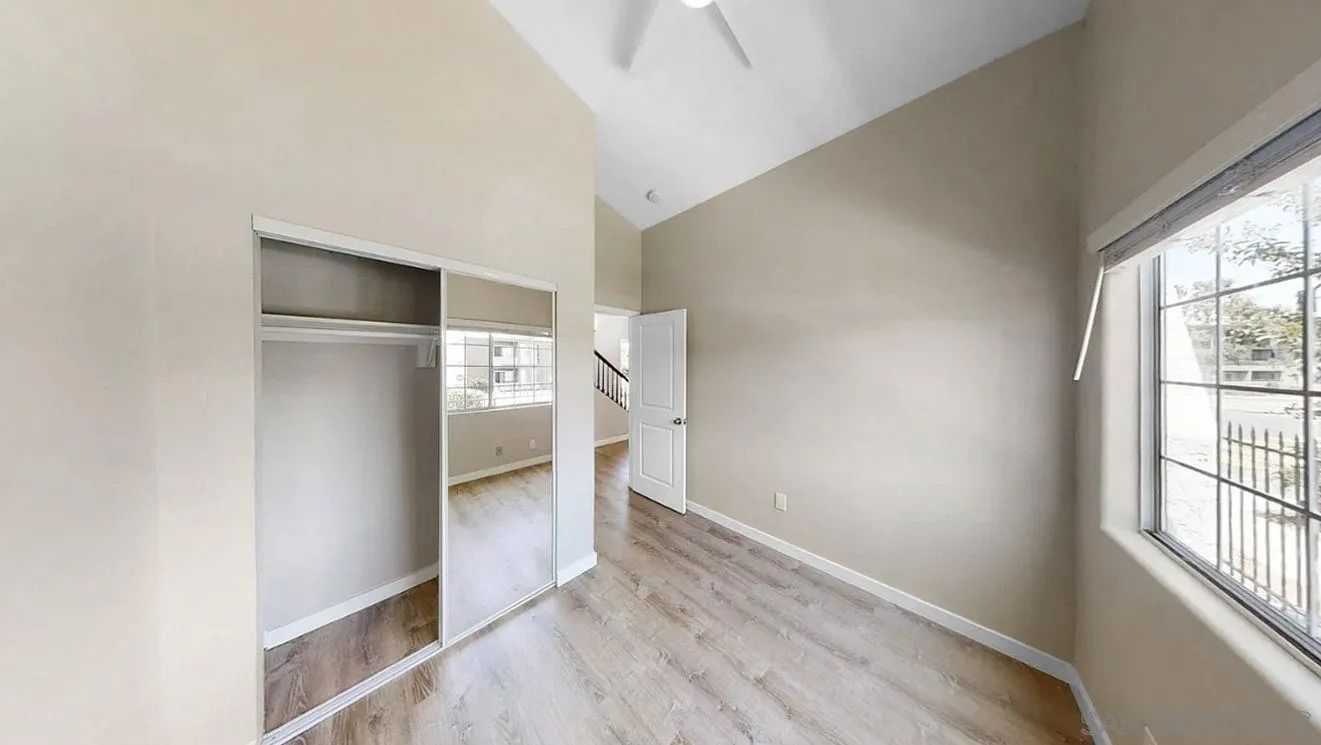 6497-99 Montezuma Road San Diego, CA 92115 - Photo 9 of 23 a view of an empty room with a window
