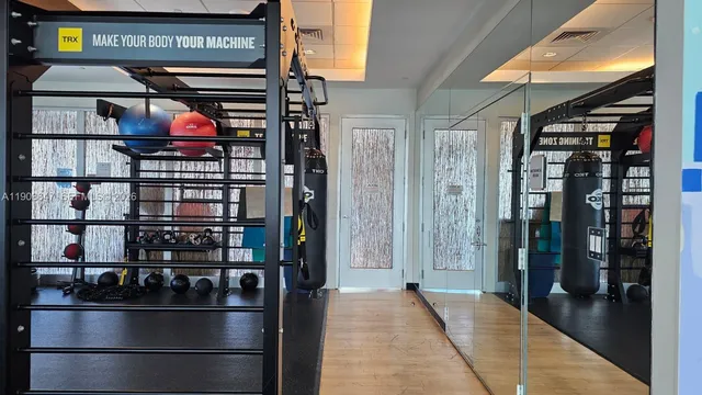 a view of a room with gym equipment