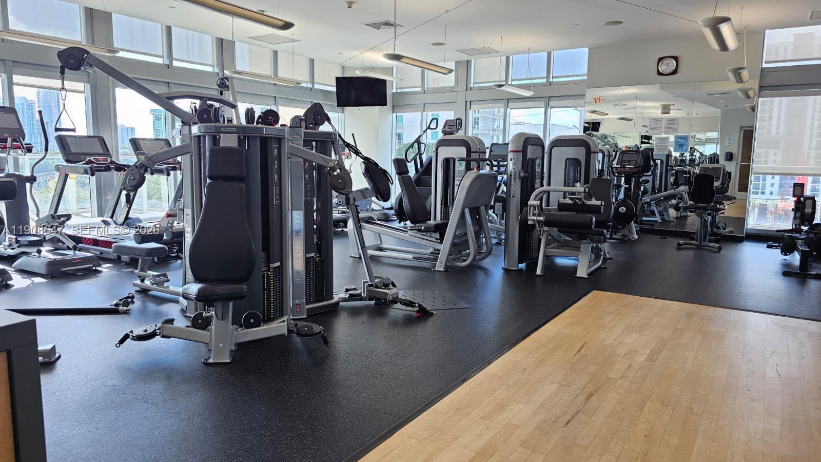 1111 Southwest 1st Avenue, Unit 2124N Miami, FL 33130 - Photo 29 of 34 a view of a room with gym equipment
