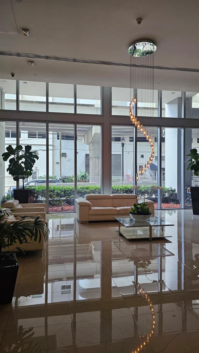 1111 Southwest 1st Avenue, Unit 2124N Miami, FL 33130 - Photo 33 of 34 a view of a entryway with couch