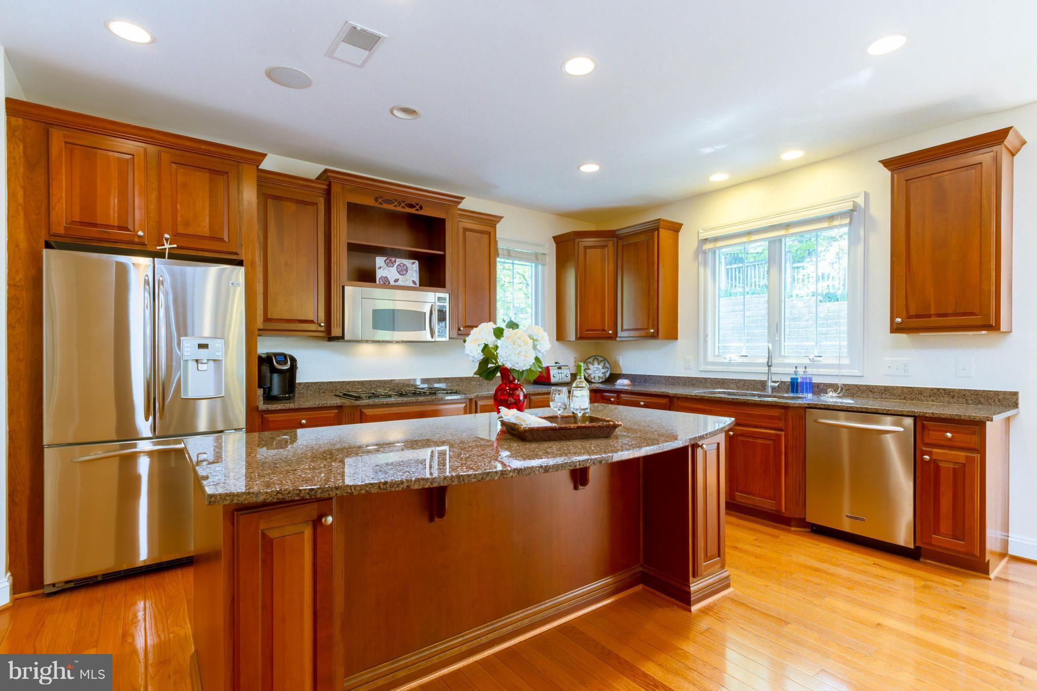 9155 Riesley Lane Vienna, VA 22182 - Photo 20 of 30 Kitchen w/cherry cabinetry & SS appliances