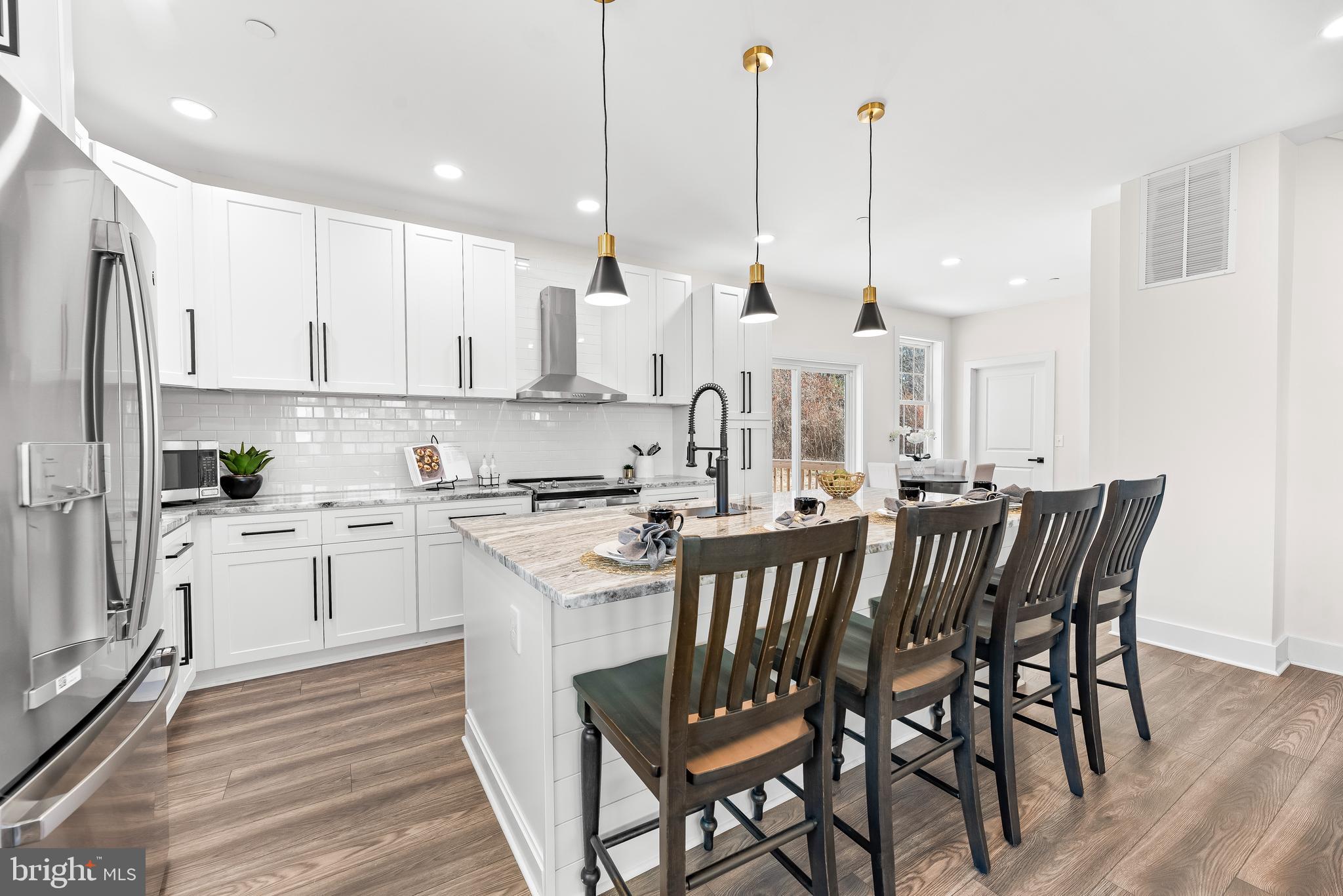 5981 Stephen Reid Road Huntingtown, MD 20639 - Photo 7 of 33 Custom Cabinets w/ Black Hardware