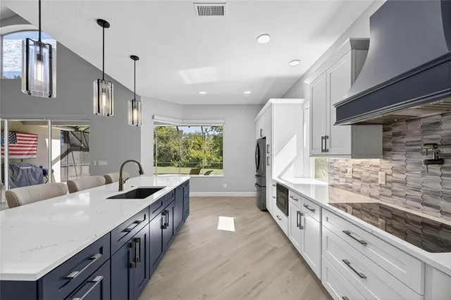 a view of a hallway with a chandelier