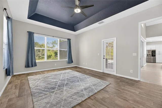 a view of an empty room with a window