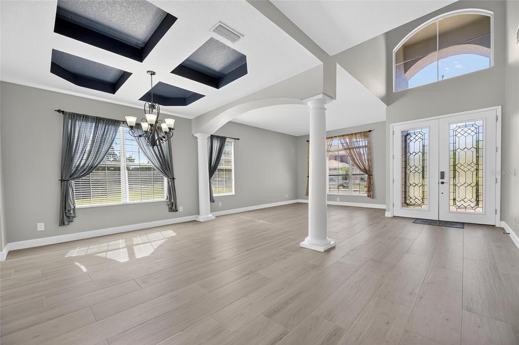 4310 70th Avenue East Ellenton, FL 34222 - Photo 54 of 97 a view of an empty room with wooden floor and a window