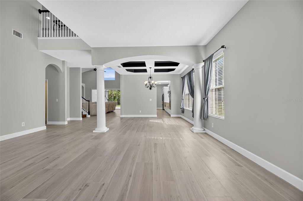 4310 70th Avenue East Ellenton, FL 34222 - Photo 57 of 97 wooden floor in an empty room with a window