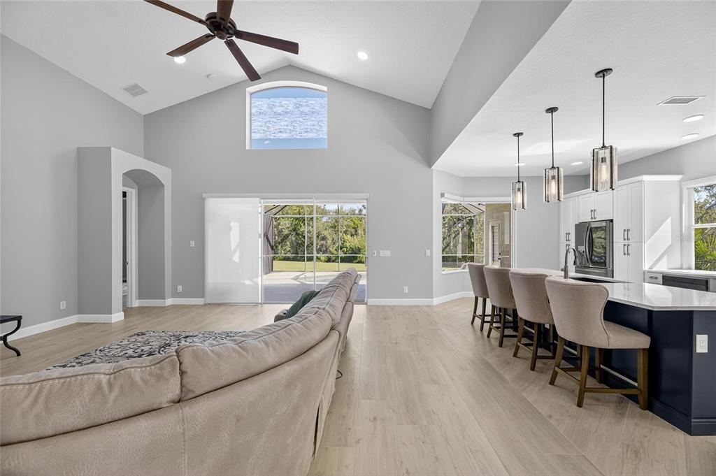 4310 70th Avenue East Ellenton, FL 34222 - Photo 62 of 97 a living room with furniture and a wooden floor