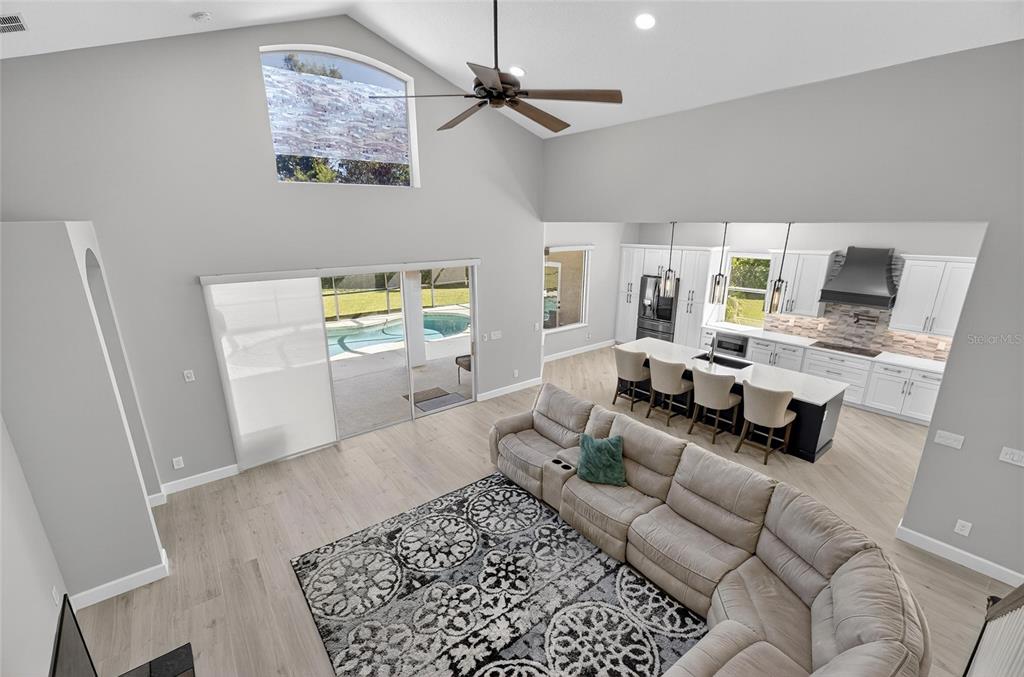 4310 70th Avenue East Ellenton, FL 34222 - Photo 85 of 97 a living room with furniture and a rug