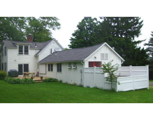 516 Westhampton Road Northampton, MA 01062 - Photo 3 of 29 a house view with a garden space