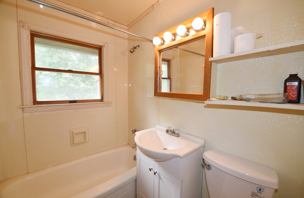 7 Gates Road Marshfield, MA 02050 - Photo 13 of 37 a bathroom with a sink a toilet and shower