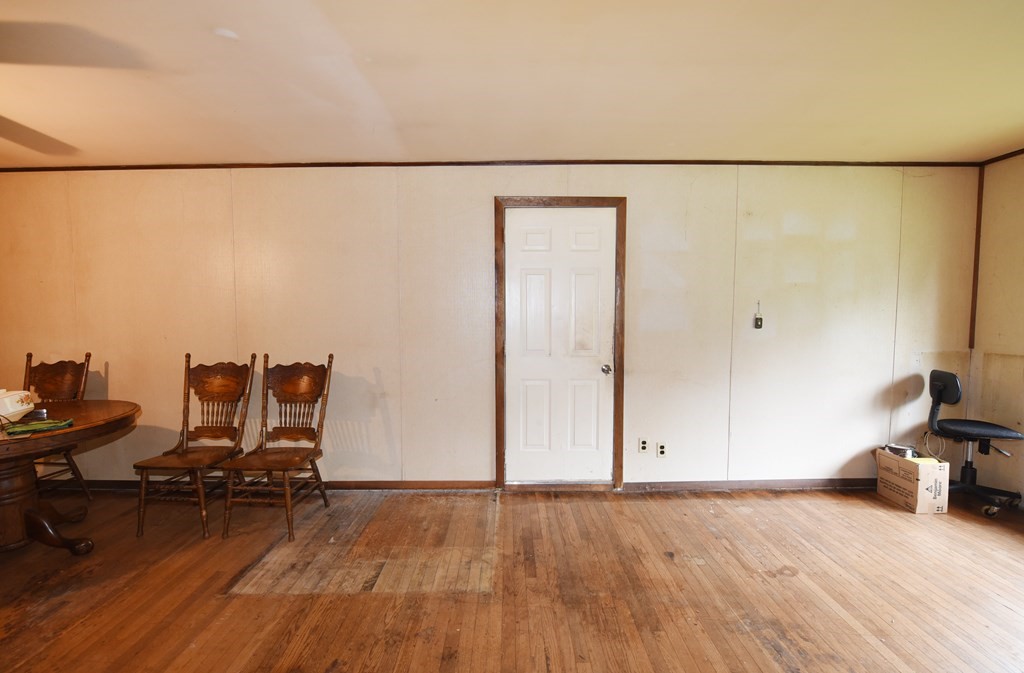 7 Gates Road Marshfield, MA 02050 - Photo 20 of 37 a view of a room with wooden floor and chair