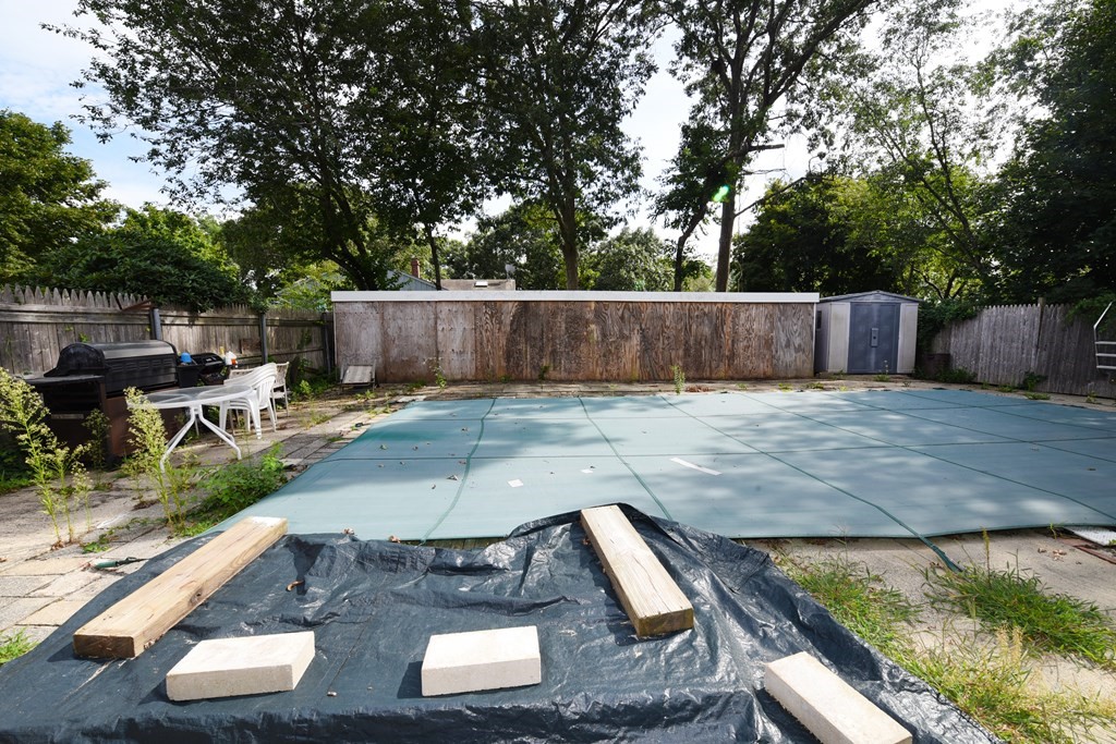 7 Gates Road Marshfield, MA 02050 - Photo 5 of 37 a view of a backyard with sitting area