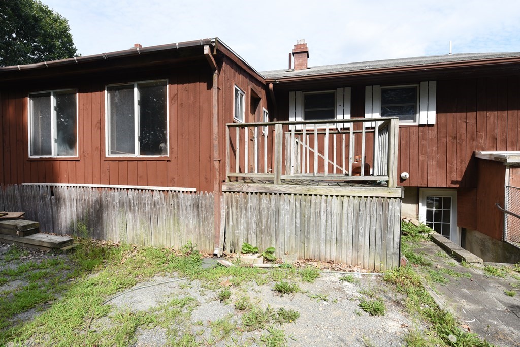 7 Gates Road Marshfield, MA 02050 - Photo 6 of 37 a front view of a house with a yard