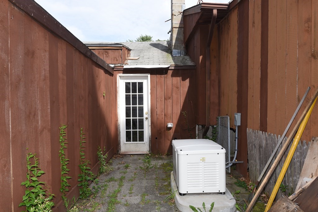7 Gates Road Marshfield, MA 02050 - Photo 7 of 37 a view of a back yard of the house