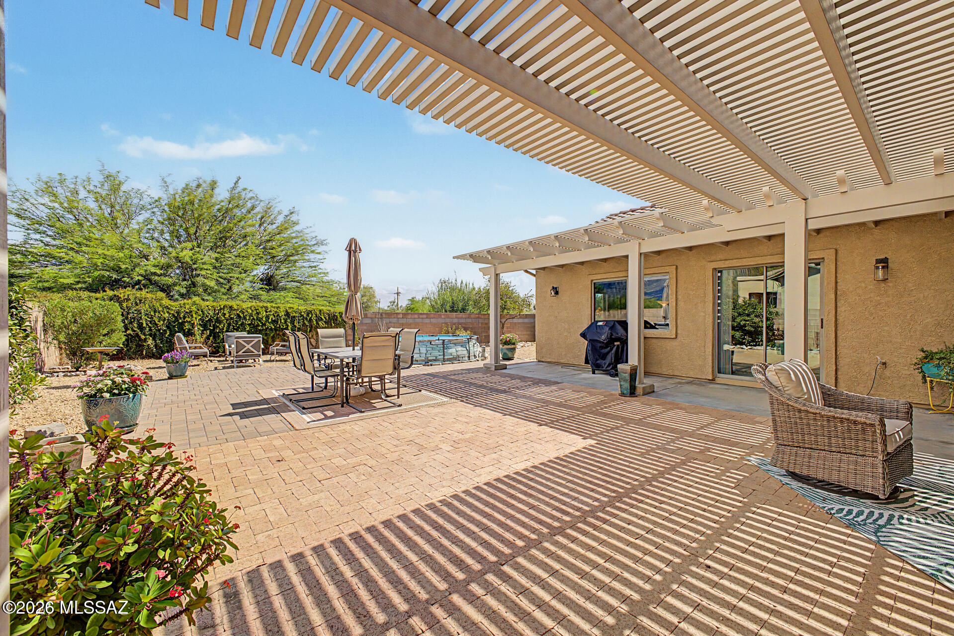 3664 East Northern Dancer Road Tucson, AZ 85739 - Photo 34 of 42 Low Maintenance Highlighting Metal Covered Patio
