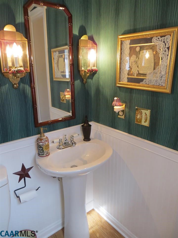 315 Grassmere Road Charlottesville, VA 22903 - Photo 11 of 32 a bathroom with a sink and a mirror
