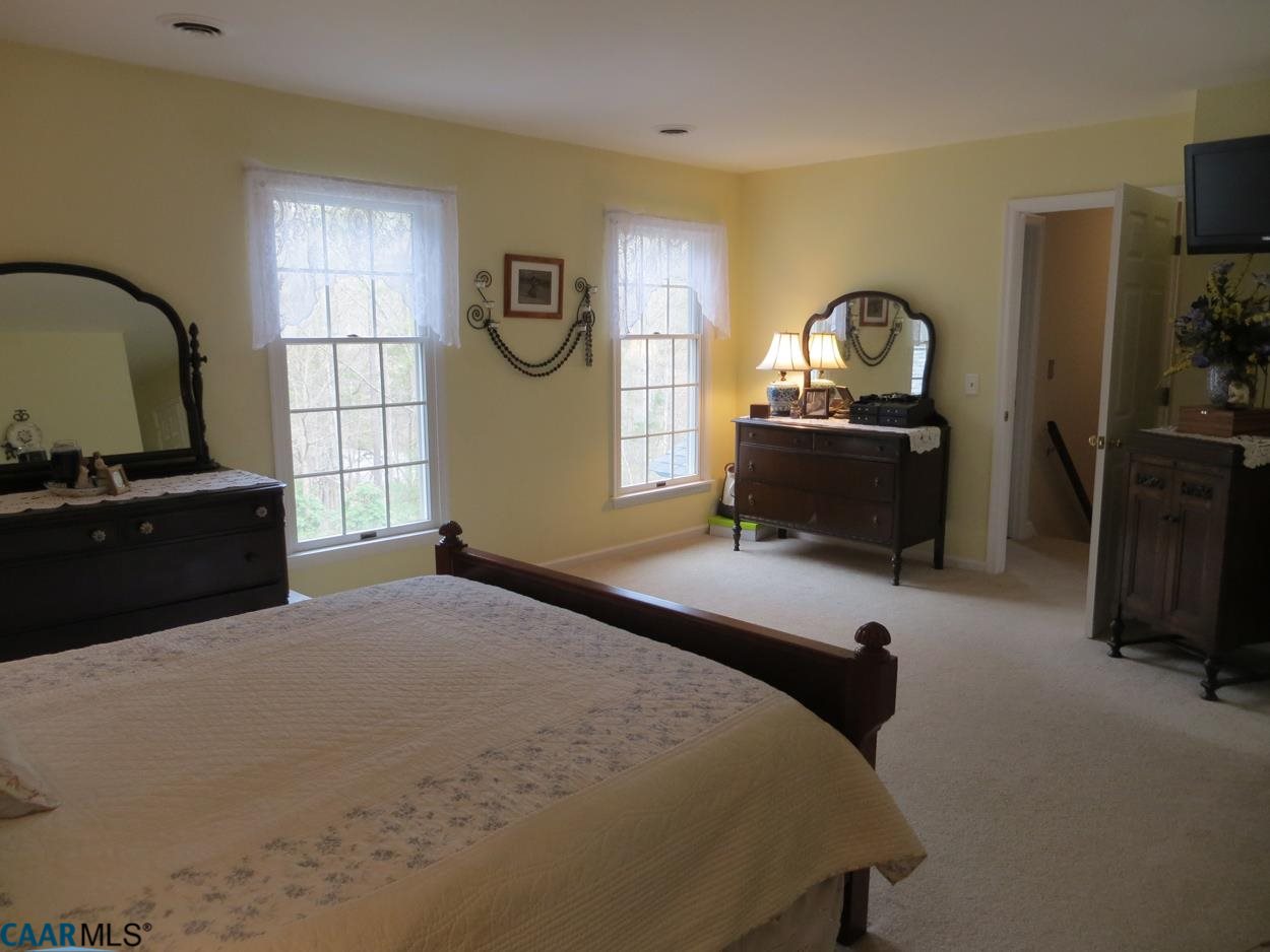 315 Grassmere Road Charlottesville, VA 22903 - Photo 13 of 32 a bedroom with furniture and a window