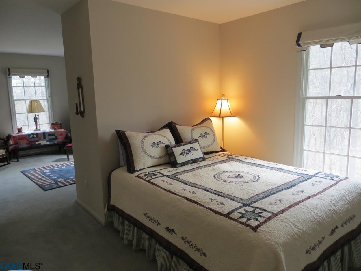 315 Grassmere Road Charlottesville, VA 22903 - Photo 16 of 32 a bedroom with a bed and a window