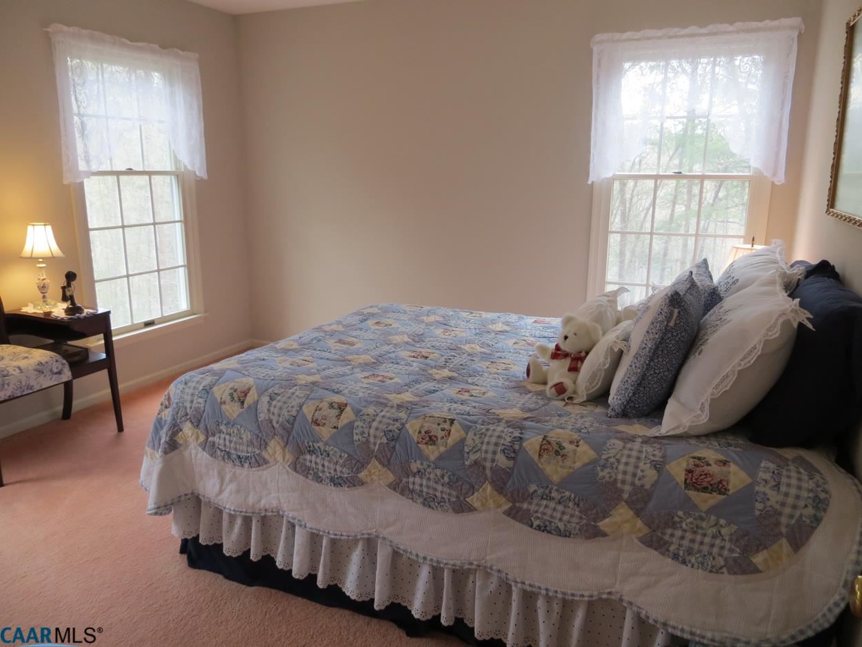 315 Grassmere Road Charlottesville, VA 22903 - Photo 18 of 32 a bedroom with a bed and window