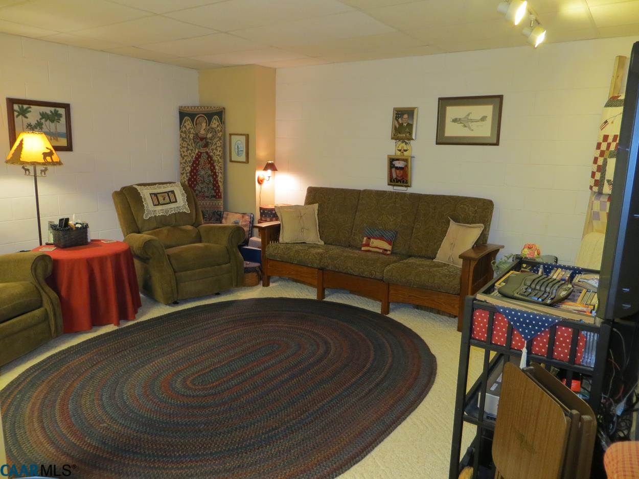 315 Grassmere Road Charlottesville, VA 22903 - Photo 20 of 32 a living room with furniture and a couch