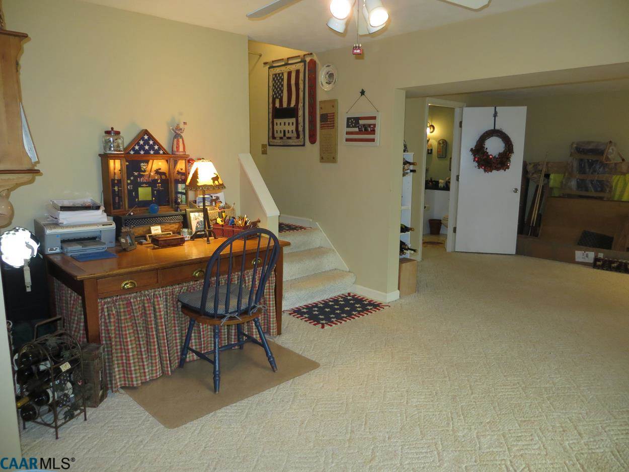 315 Grassmere Road Charlottesville, VA 22903 - Photo 21 of 32 a dining room with furniture and chandelier