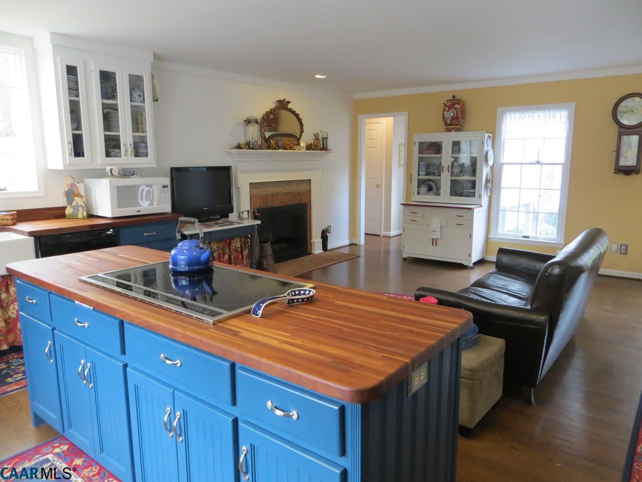 315 Grassmere Road Charlottesville, VA 22903 - Photo 9 of 32 a kitchen with a stove a sink and a refrigerator