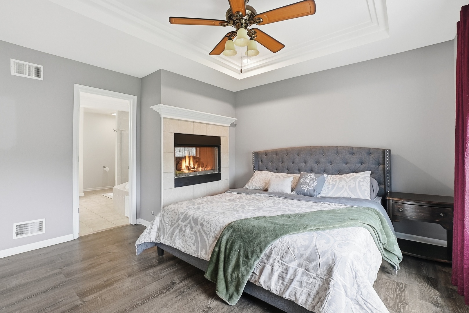S635 Robbins Street Winfield, IL 60190 - Photo 11 of 35 a bedroom with a bed and a chandelier